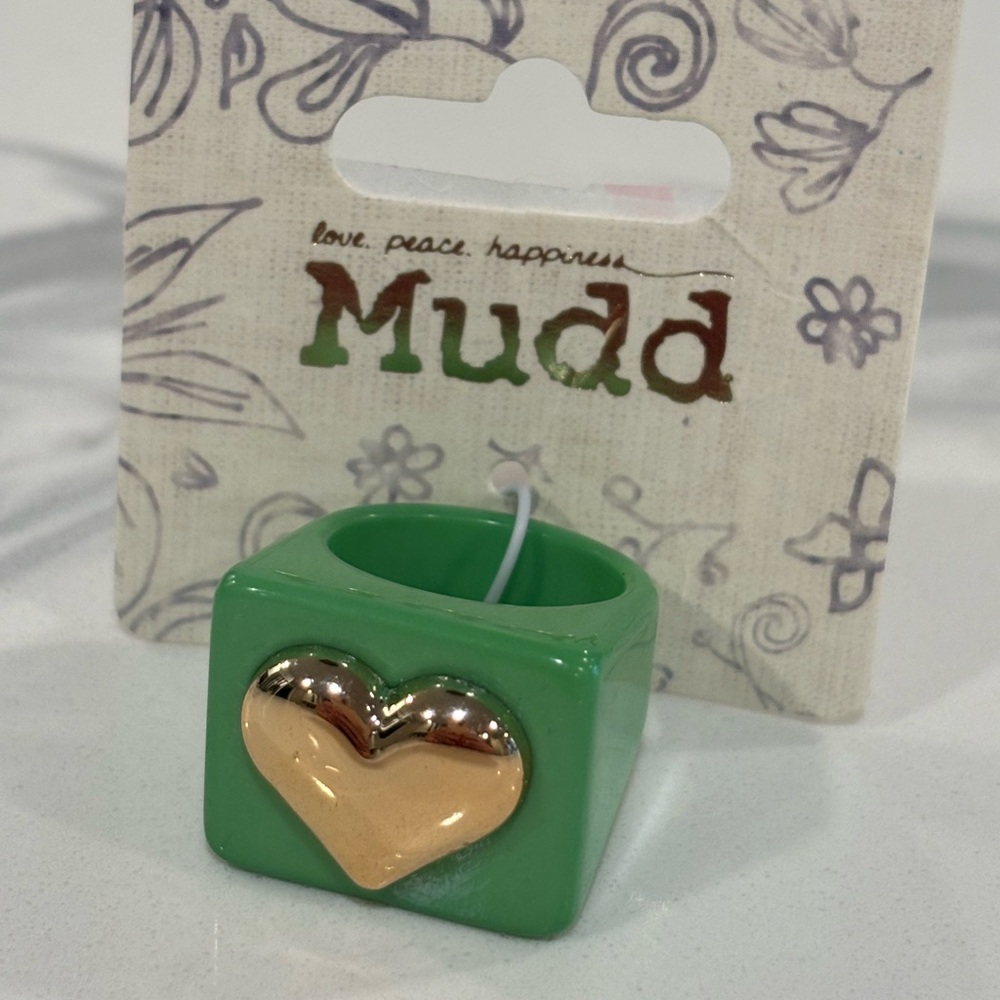 Green ring with gold heart